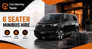 A modern, premium 6-seater minibus hire vehicle parked outside an executive venue, ideal for small group travel.